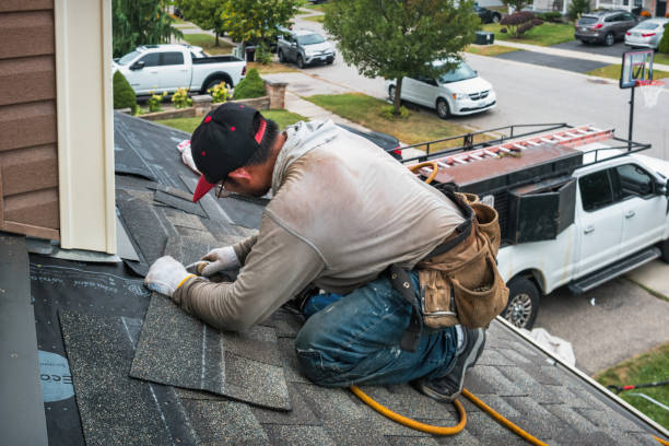 Professional Roofing technician working in Orchards, WA
